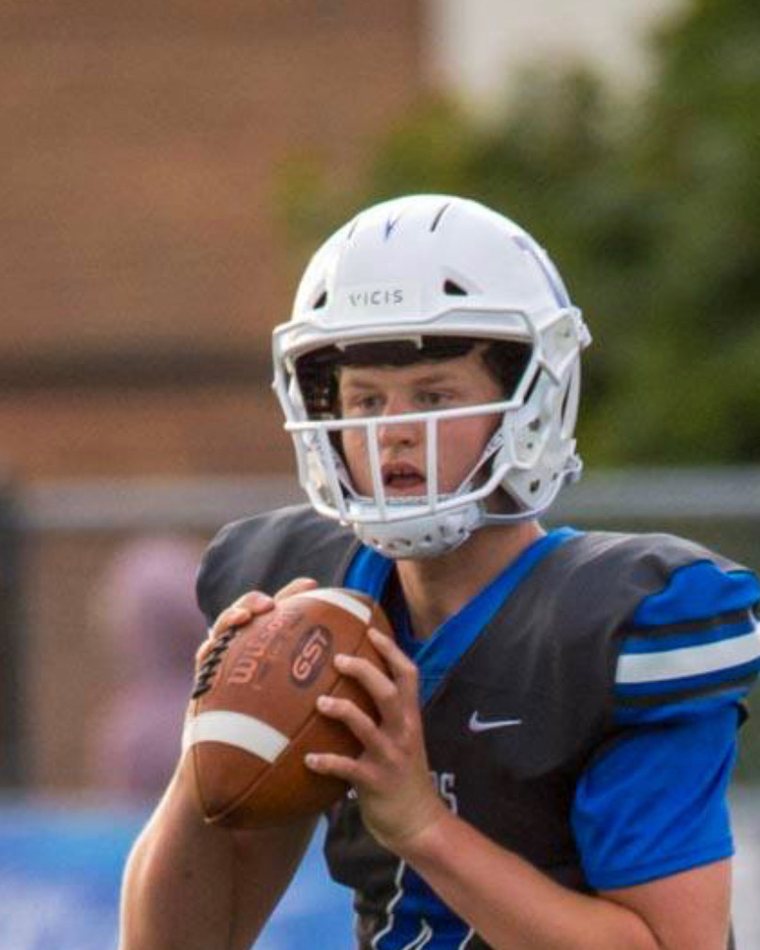 Zach Trainor at quarterback, dropping back to throw